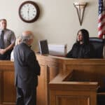 Attorneys in Court at the Bench with the Judge