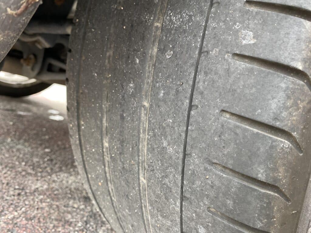 Worn tires found during pre-purchase used car inspection